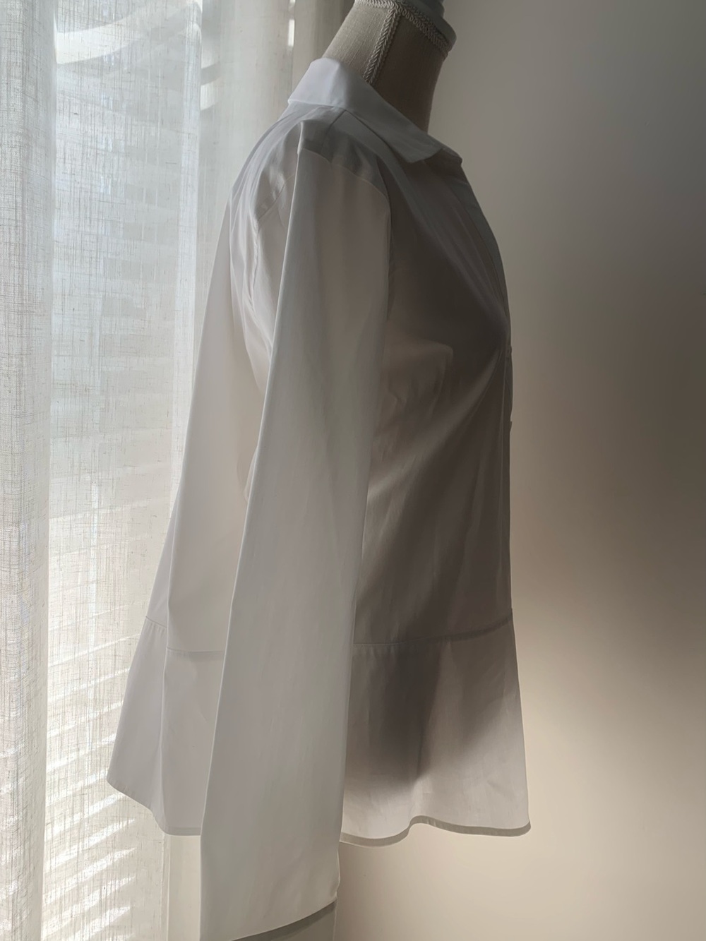 Classic White Button-Front Peplum Blouse with Asymmetrical Design - Picture 3 of 7